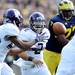 Northwestern quarterback Kain Colter tosses the ball to tailback Vernic Mark during the second quarter against Northwestern at Michigan Stadium on Saturday. Melanie Maxwell I AnnArbor.com